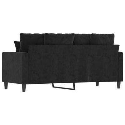 Back view of black sofa with cushions, showing chaise-like extension underframe