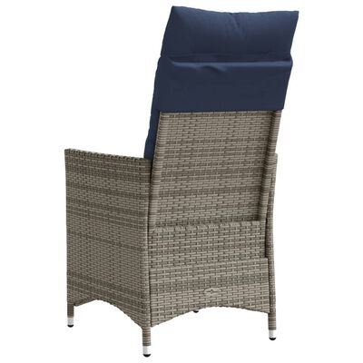 Rear-side view of wicker armchair with navy cushion