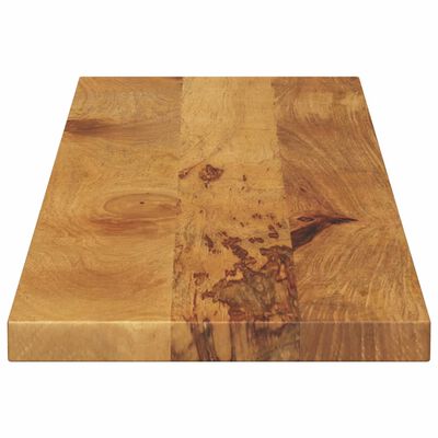 Cutting board or thick wooden slab with natural grain and end grain visible.