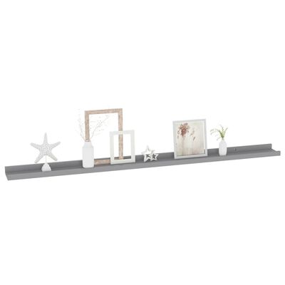 Gray floating shelf with small decor items