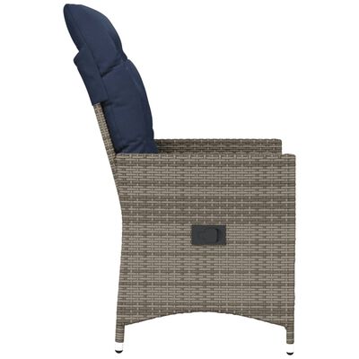 Side view of wicker armchair with navy cushion