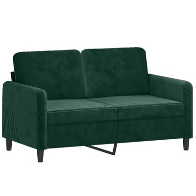Green sofa armrest and seat cushions of a sofa with metal legs and a pull-out mechanism visible.