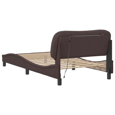 Back view of bed frame showing fold-out mechanism with mattress slats.