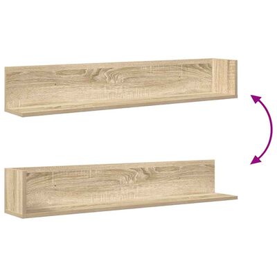 Two wooden shelves stacked vertically with a hinge showing, purple curved arrows indicating a swivel or fold.