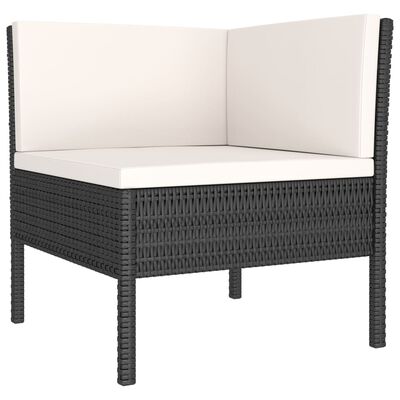 Close-up of an outdoor wicker ottoman with white cushion and backrest.