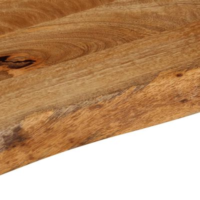 Close-up of a wood grain pattern on a cutting board edge.