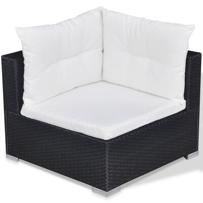 Corner armchair with white cushions and dark wicker, compact layout.