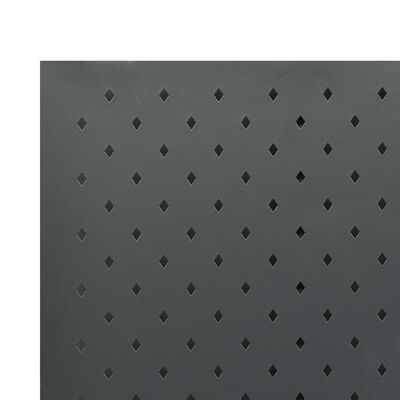 Close-up of a perforated panel with diamond-shaped holes on a dark gray surface.