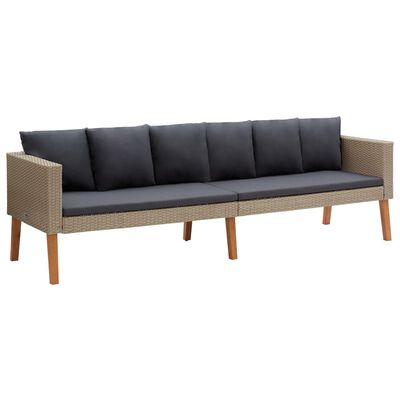 Three-seat wicker sofa with dark gray cushions and wooden legs