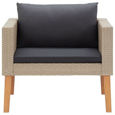 Single wicker lounge chair with dark gray cushion and wooden legs