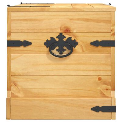 Close-up of front panel of wooden chest showing black handle/knob and decorative lock plate.