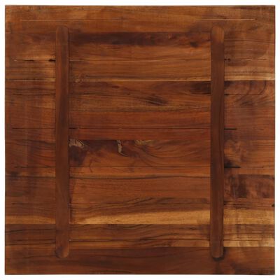 Back side of wooden cutting board showing two support slats