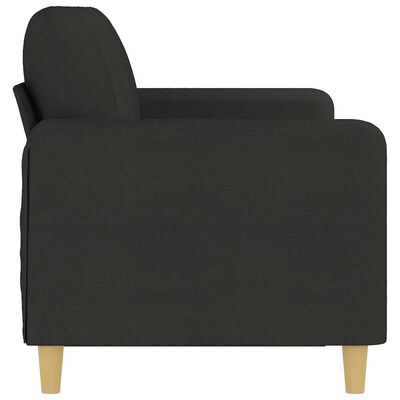 Close-up side view of dark gray armrest and cushion on sofa showing fabric texture and leg.
