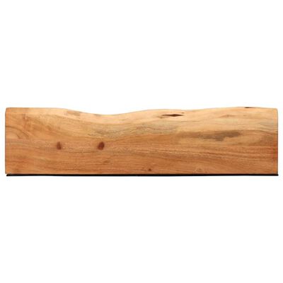 End of a wooden plank showing curved edge and grain