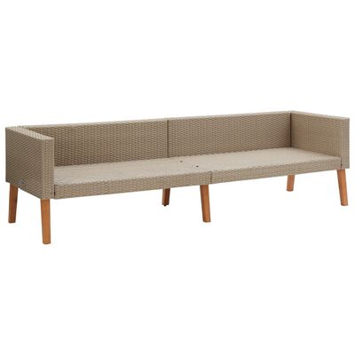 Long wicker loveseat or sectional component with beige cushions