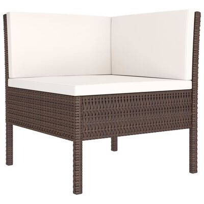 Brown woven corner chair with white cushions, two back cushions forming a partial corner seat.