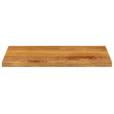 Wooden cutting board viewed from a low angle, front edge visible