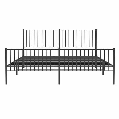 Front view of a large black metal bed frame with two tall headboard sections and slatted base, no bedding.