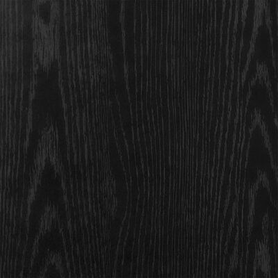 Close-up wood grain texture on the black cabinet surface.