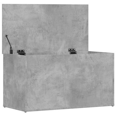 Openable concrete grey storage trunk with lid open and hinges visible