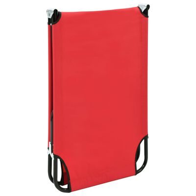 Red cot fabric standing upright showing edges and corners.