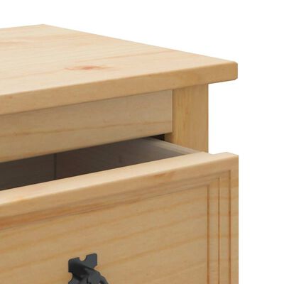 Close-up of top drawer area of wooden cabinet showing handle and wood grain
