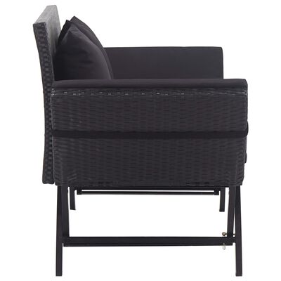 Side view of a dark wicker loveseat with cushions, metal frame legs visible