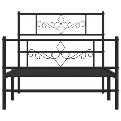 Close-up of bed frame with ornate scrollwork on headboard; full bed frame visible