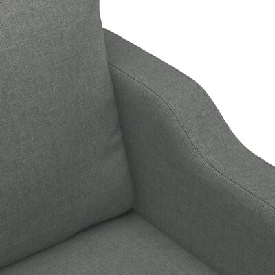 Close-up of grey fabric upholstery texture on sofa arm.