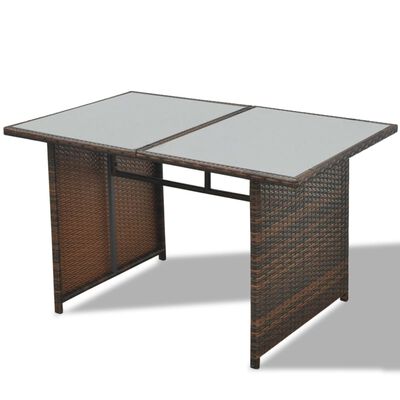 Brown wicker dining table with glass tops