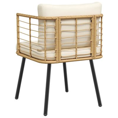 Rear perspective of a rattan lounge chair with cushion and black legs, showing woven sides.
