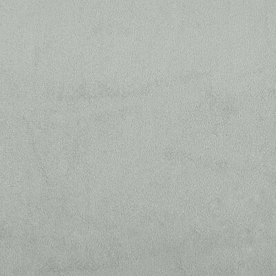 Texture close-up of light gray fabric upholstery used on the bed.