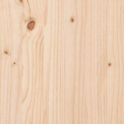 Close-up of wood grain on vertical wooden planks with knots.