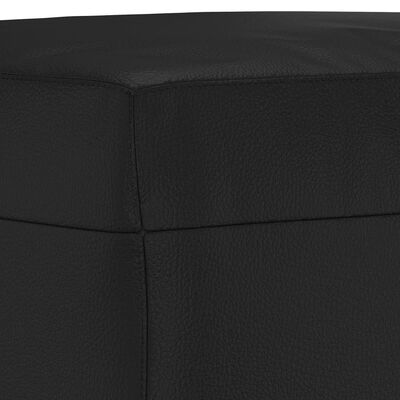 Close-up of sofa edge and seam on black leather-like fabric