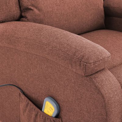 Close-up of brown fabric upholstery and armrest with built-in pocket containing a remote.