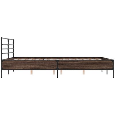 Side view of a long metal bed frame with dark wood panels