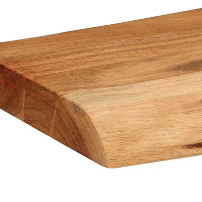 Close-up of curved edge and wood grain on a wooden plank