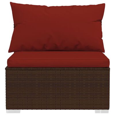Single wicker chair with red seat cushion and back cushion.
