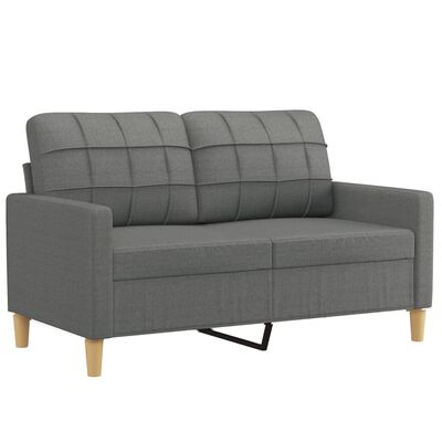 Grey loveseat with grid-tufted back cushions, wooden legs, and metal support base