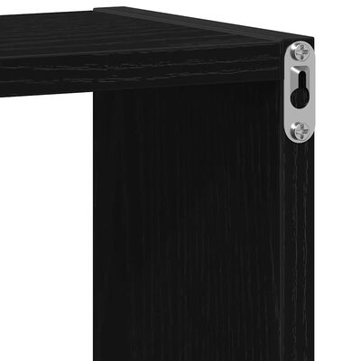 Close-up of metal bracket and corner of black bookshelf