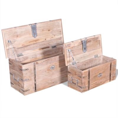 Two wooden chests of different sizes opened slightly, showing hollow interiors and metal hardware