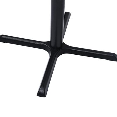 Close-up of the base junction where legs meet the central column