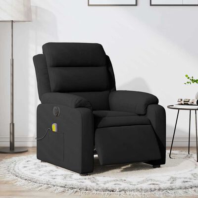 Black reclining armchair in living room with side pocket showing remote and power cord; chair in normal sitting position