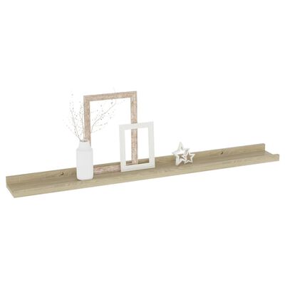 A wooden shelf with decorative items including frames and vases arranged on it