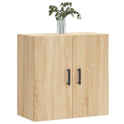 Wooden cabinet with plant on top and two doors