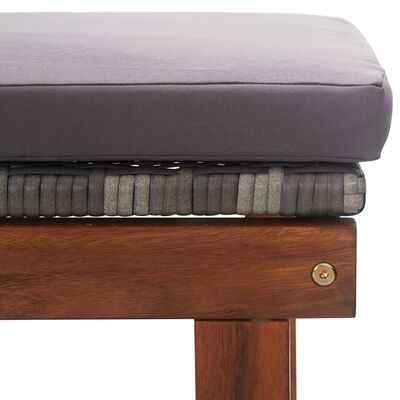 Close-up of edge of wooden frame with cushion, showing screws