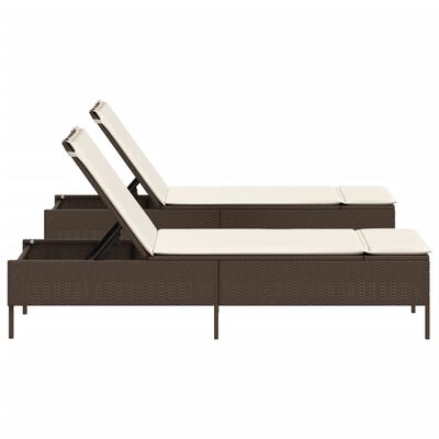 Wicker chaise lounge with footrest raised and cream cushions