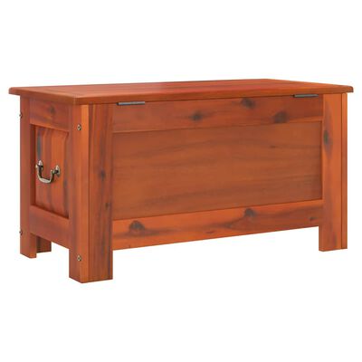 Long wooden storage bench with side handles and a visible large front panel.