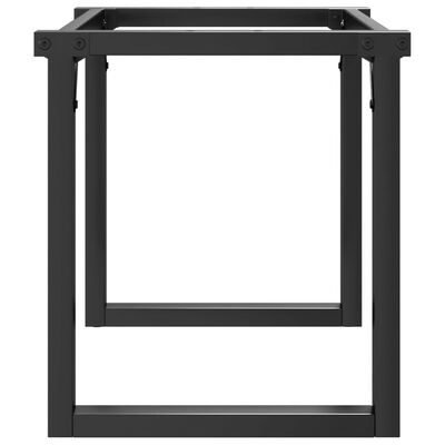 Underframe and legs of the black metal desk frame showing assembly points.