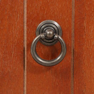 Metal ring handle mounted on wooden chest